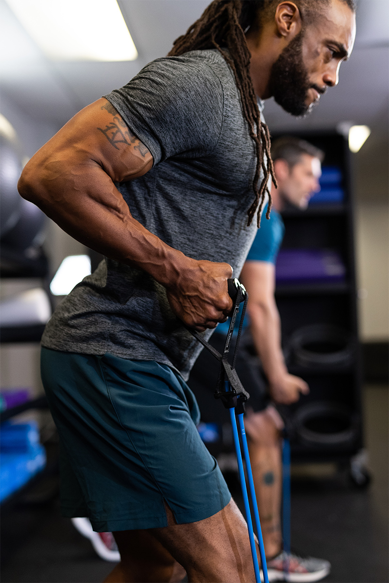 man working out using Versa Tube Plus